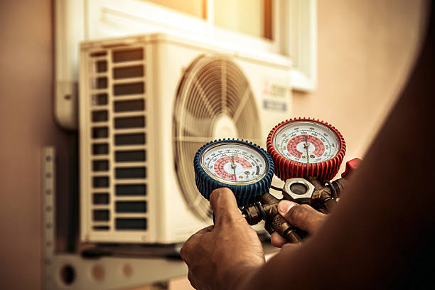 Professional Air Conditioning Service technician working in Hopewell, VA